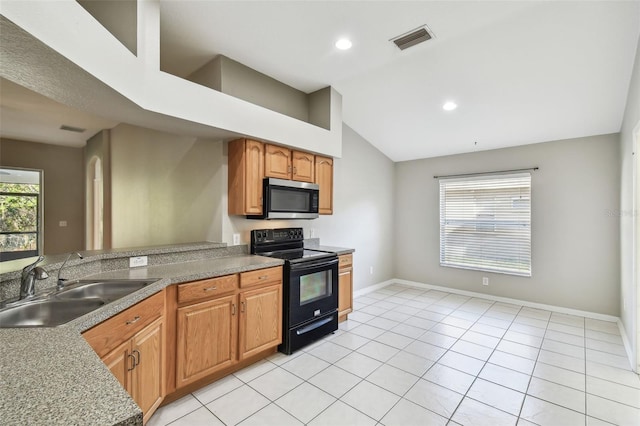 kitchen with light tile patterned floors, electric range, a sink, visible vents, and stainless steel microwave