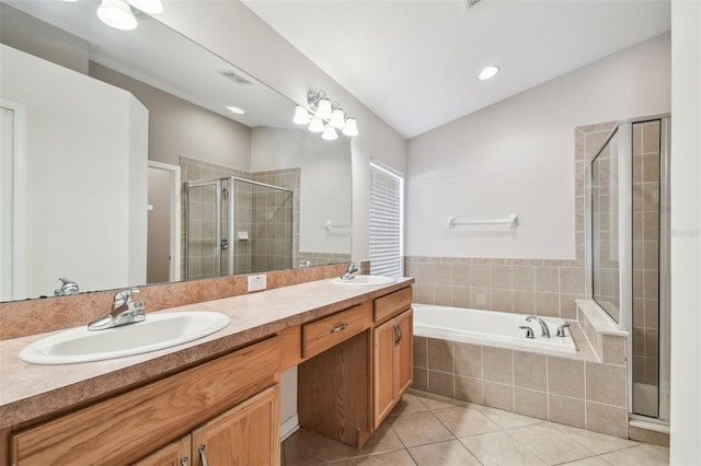 full bath featuring lofted ceiling, tile patterned flooring, a sink, and a shower stall