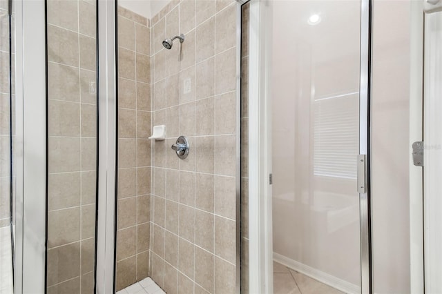 bathroom featuring a stall shower and tile patterned floors