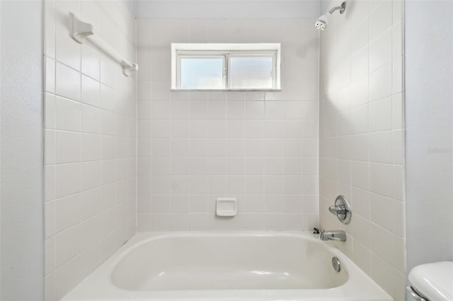 full bathroom featuring toilet and shower / bathtub combination