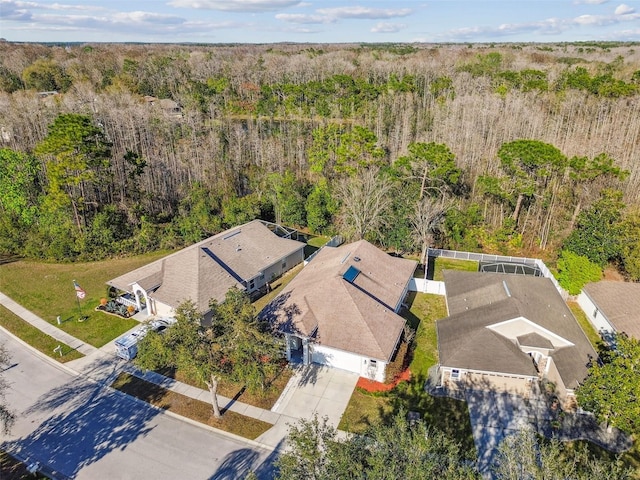 aerial view with a wooded view