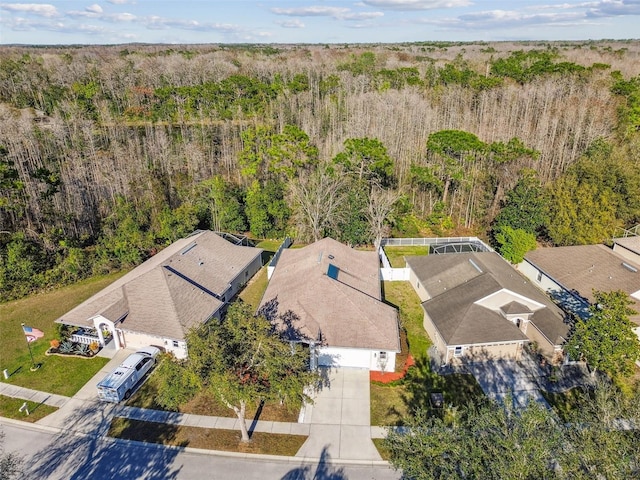 aerial view featuring a forest view