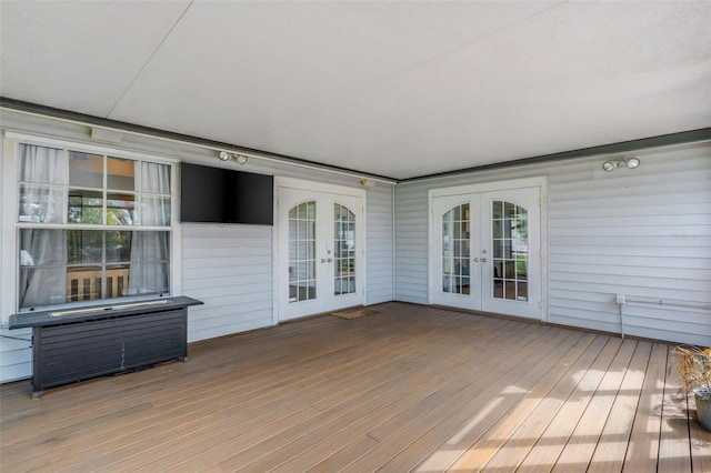 wooden terrace featuring french doors