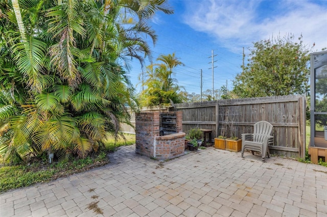 view of patio featuring fence