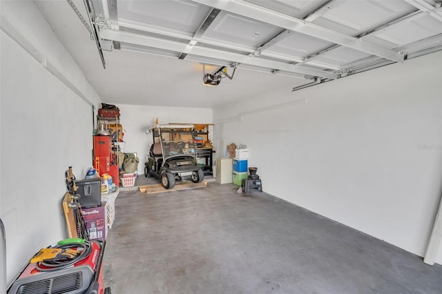 garage featuring a garage door opener