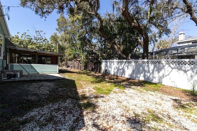 view of yard with fence