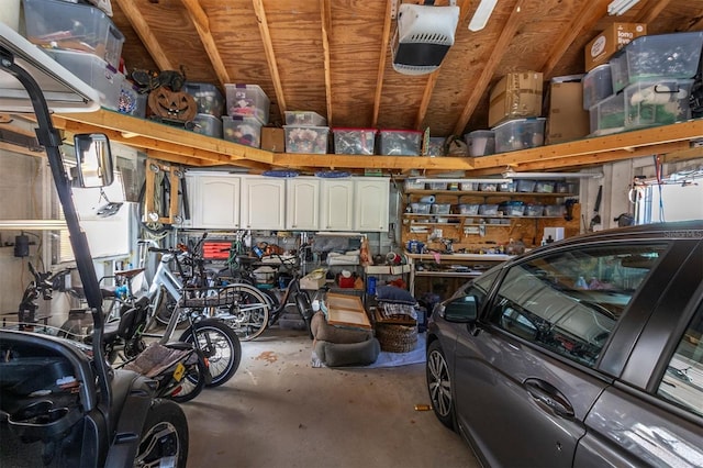 garage featuring a garage door opener