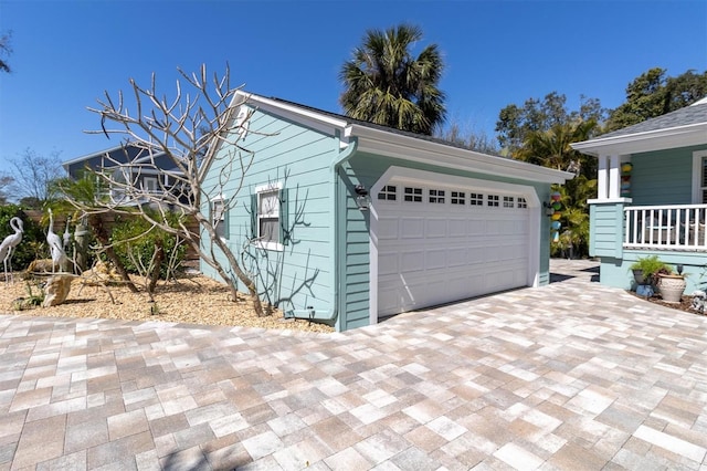 garage featuring driveway