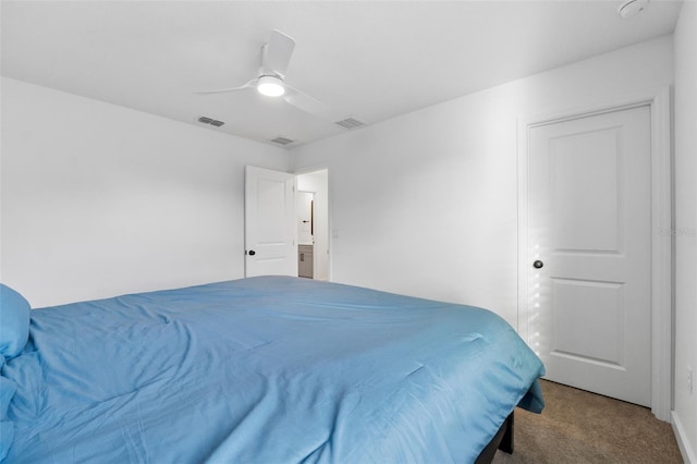 bedroom with ceiling fan, carpet flooring, and visible vents