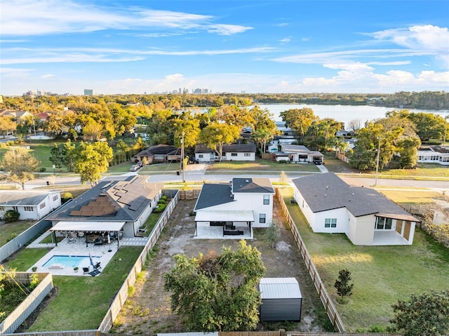 aerial view with a water view and a residential view