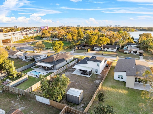 aerial view with a water view and a residential view