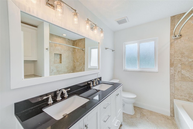 bathroom with baseboards, a sink, visible vents, and toilet