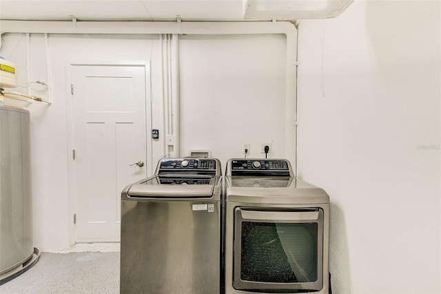 laundry area with laundry area and independent washer and dryer