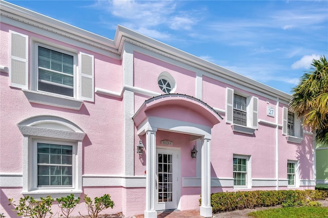 view of front of home featuring stucco siding