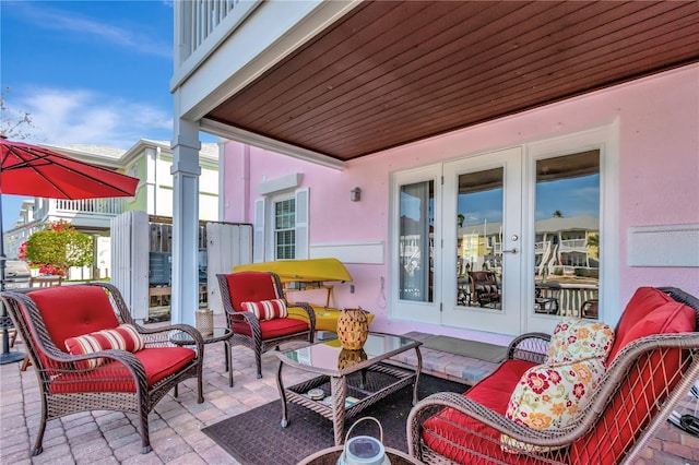 view of patio / terrace featuring french doors and an outdoor hangout area