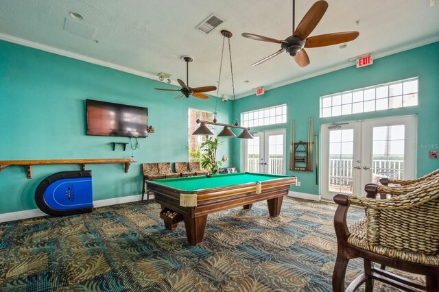 playroom with baseboards, visible vents, carpet, crown molding, and french doors