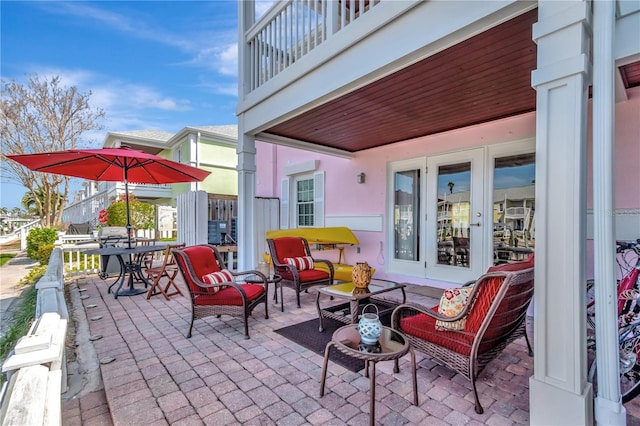 view of patio / terrace featuring french doors and an outdoor living space