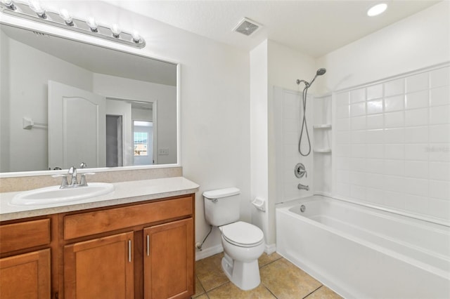 full bath featuring shower / washtub combination, visible vents, toilet, vanity, and tile patterned flooring