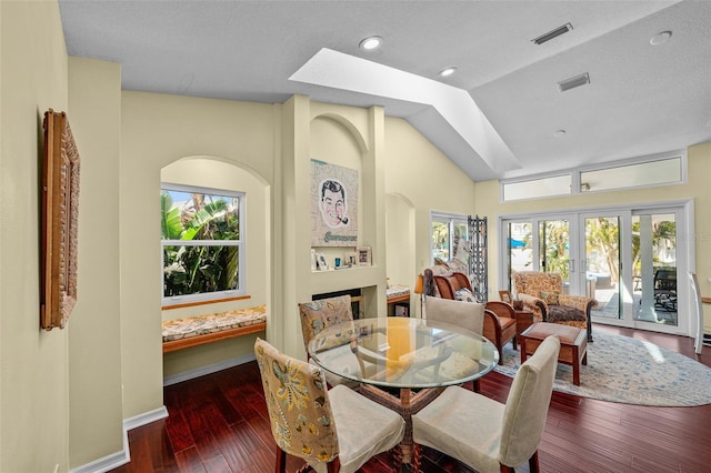 dining room with a wealth of natural light and visible vents