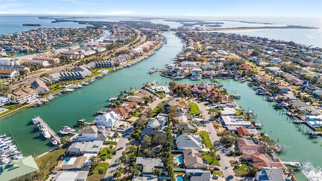 bird's eye view featuring a water view and a residential view