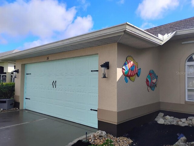 garage with driveway