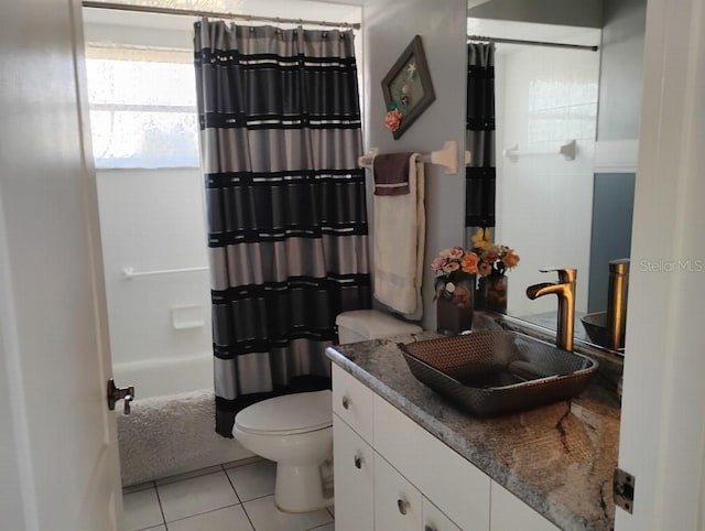 full bathroom with tile patterned flooring, vanity, toilet, and shower / bath combo