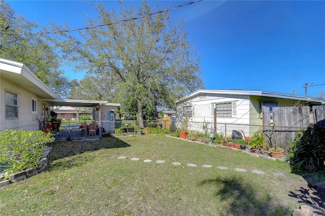 view of yard with fence