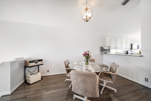 dining room featuring an inviting chandelier, baseboards, visible vents, and dark wood-style flooring