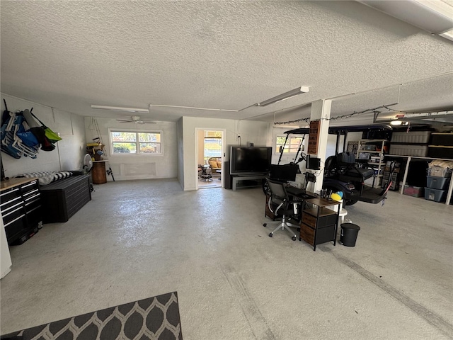 garage featuring a ceiling fan