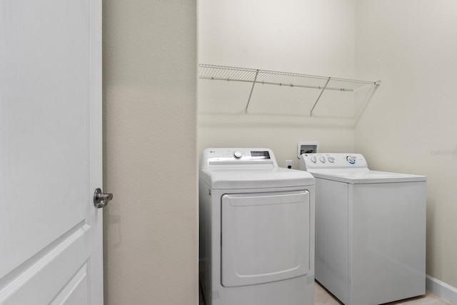 laundry area featuring laundry area and separate washer and dryer