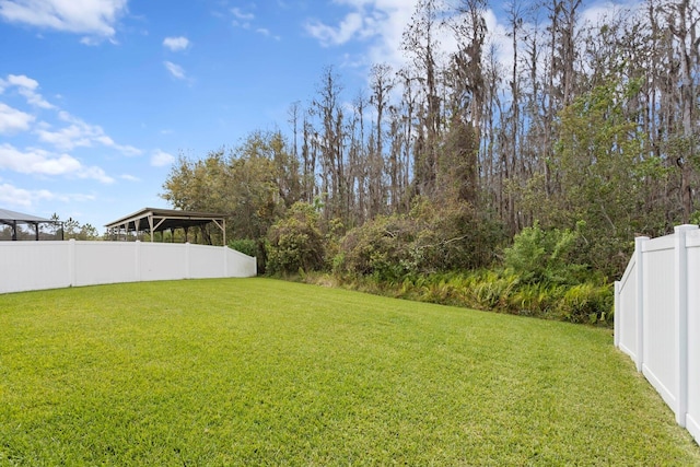 view of yard featuring fence