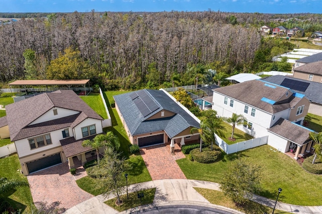 aerial view featuring a residential view and a forest view