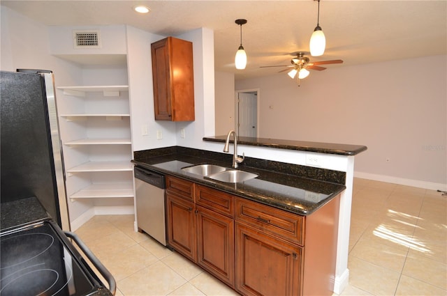 kitchen with visible vents, brown cabinets, a sink, stainless steel appliances, and light tile patterned floors