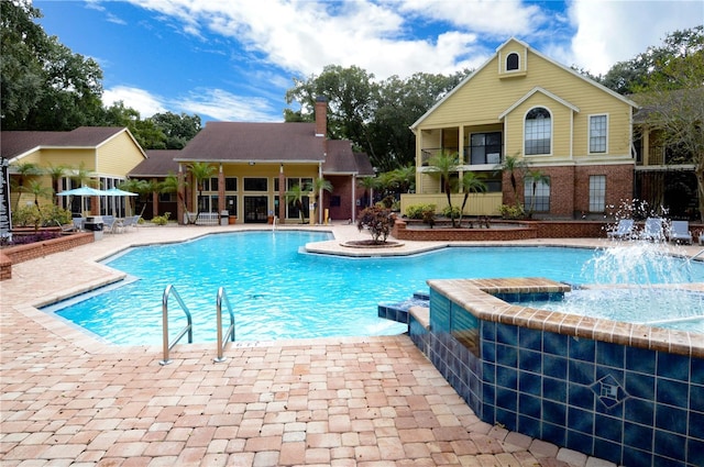 community pool with a patio