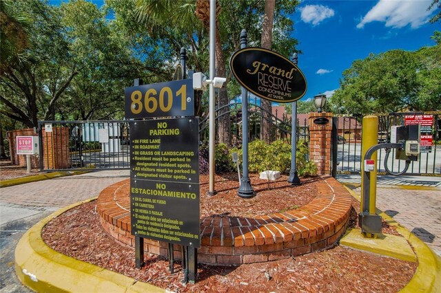 surrounding community featuring fence and a gate