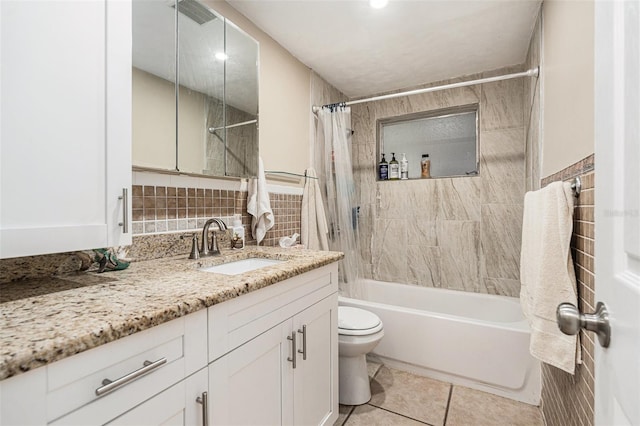 full bath with visible vents, toilet, tile patterned floors, shower / bath combination with curtain, and tile walls