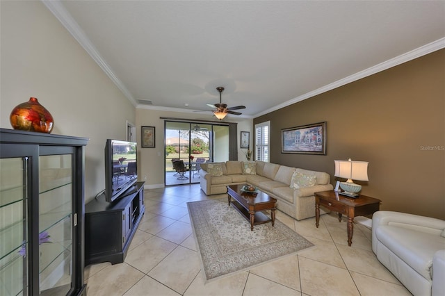 living area with light tile patterned floors, baseboards, visible vents, a ceiling fan, and crown molding