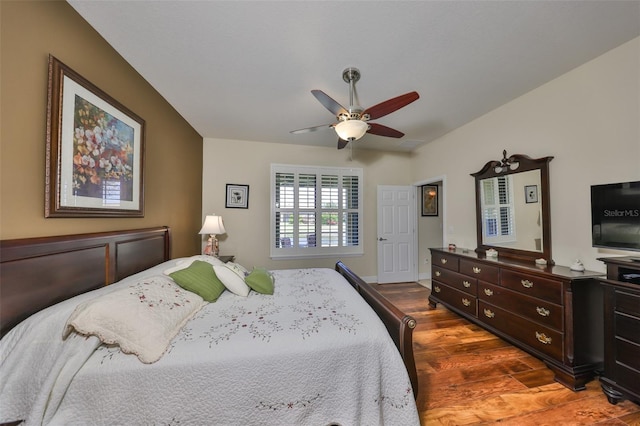 bedroom with ceiling fan and wood finished floors