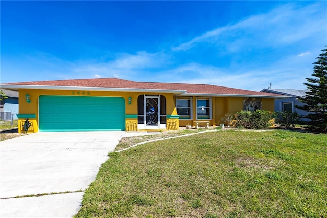 ranch-style house featuring an attached garage, driveway, a front lawn, and stucco siding