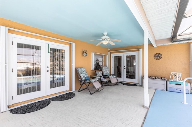 view of patio / terrace with ceiling fan and french doors