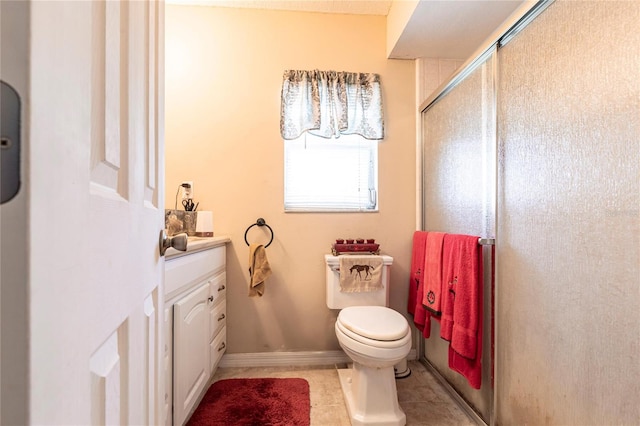 bathroom with baseboards, toilet, tile patterned flooring, an enclosed shower, and vanity