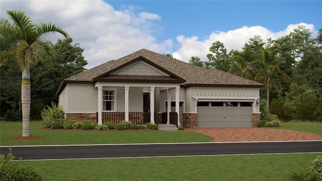 craftsman-style home with stucco siding, a shingled roof, a garage, stone siding, and a front lawn