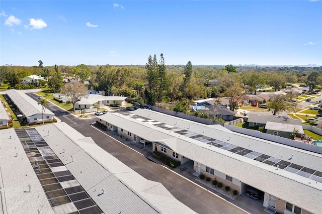 birds eye view of property with a residential view