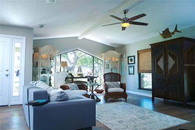 living area with vaulted ceiling with beams, a healthy amount of sunlight, dark wood-style floors, and a ceiling fan