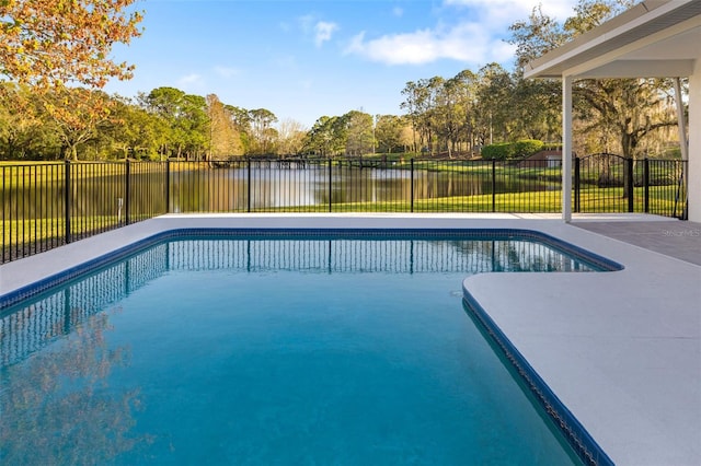 view of swimming pool featuring a water view, a fenced backyard, and a fenced in pool