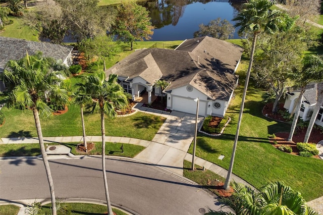 bird's eye view with a water view