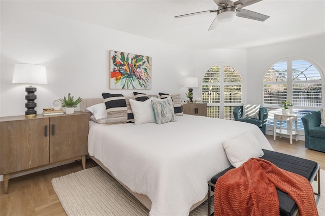 bedroom featuring ceiling fan and light wood finished floors