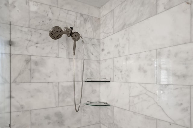 details featuring a tile shower