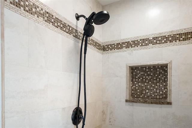 details with a tile shower