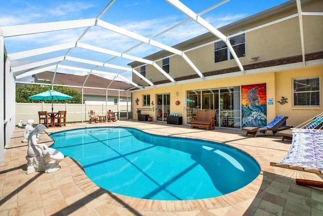 view of swimming pool featuring a fenced in pool, outdoor dining area, a patio area, and fence